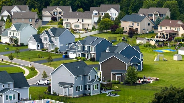 View from above of residential houses in living area in Rochester NY American dream homes as example of real estate development in US suburbs