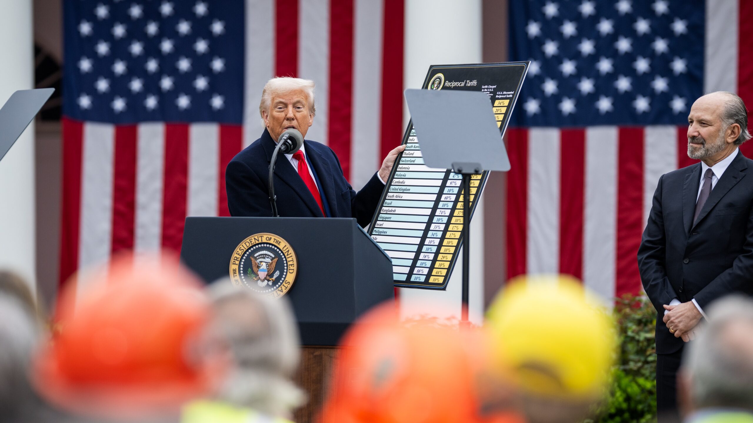 Trump showing a chart with reciprocal tariffs
