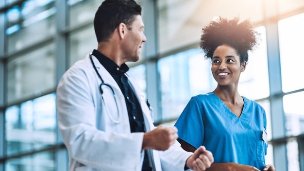 Medical team and advice on plan in hospital walking and support or collaboration for medicine Doctor people and consulting on healthcare treatment or diagnosis nurses and talk for solidarity