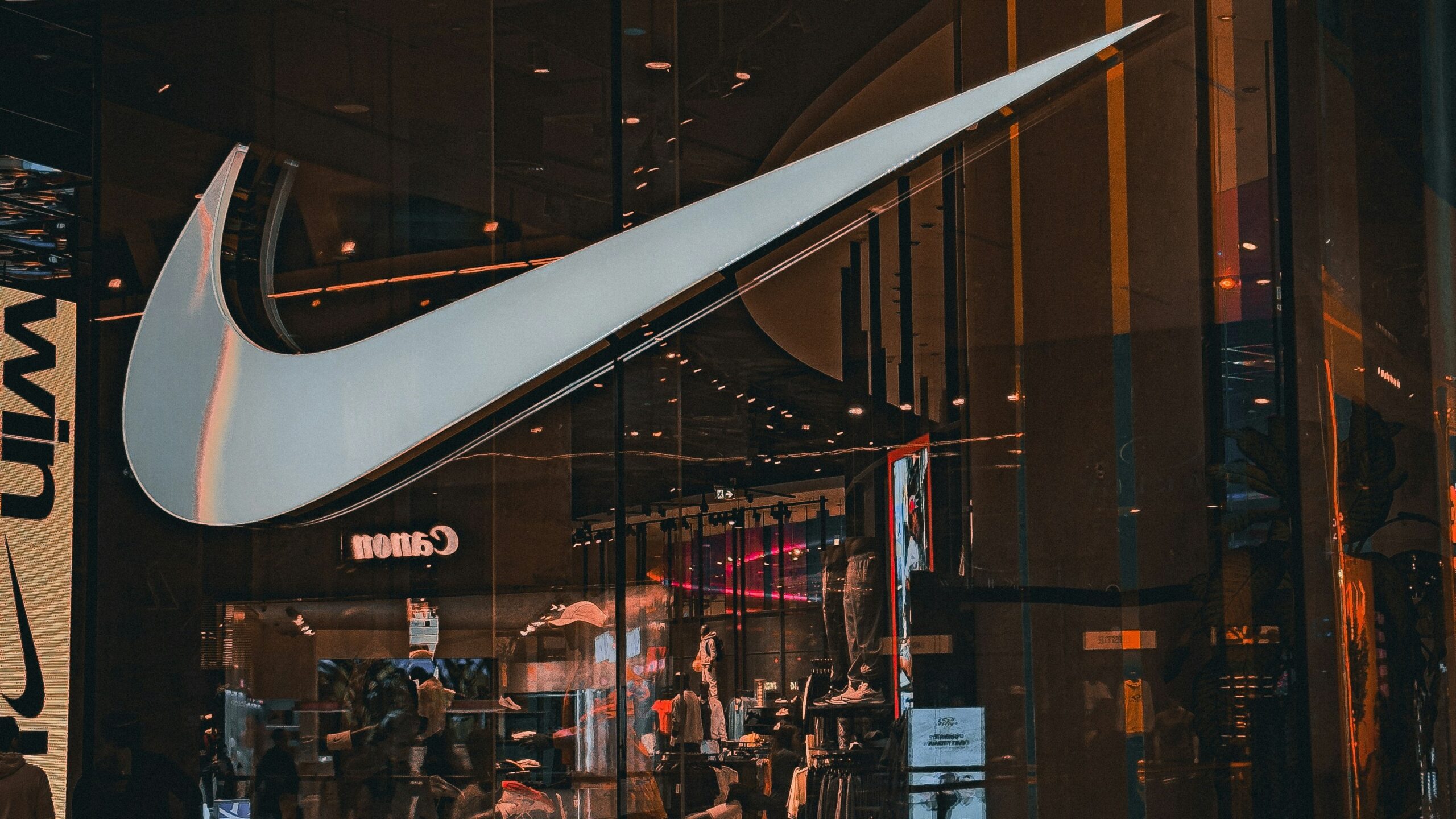 A store front with a nike logo on it