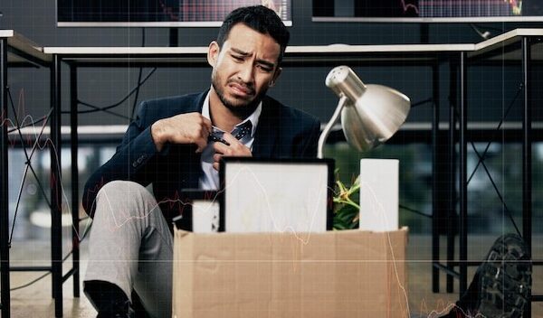 Businessman stress and unemployment in office with worry anxiety or sad for job loss Stock broker employee and mental health in market crash recession or financial crisis and retrenched on floor