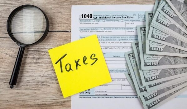 1040 tax form on a wooden table Tax time Financial concept