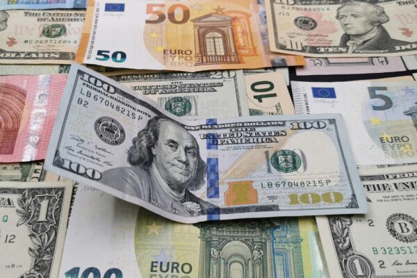 a pile of money sitting on top of each other