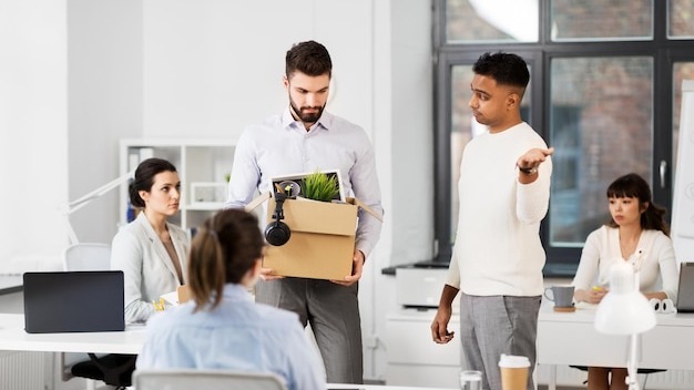 fired sad male office worker leaving