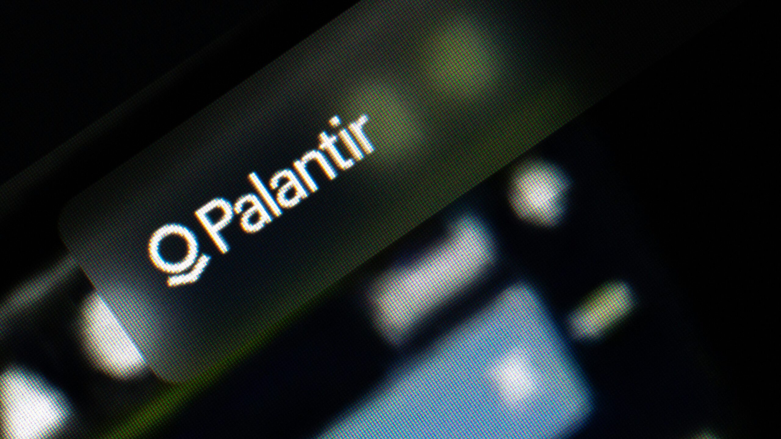 Palantir logo on a dark background