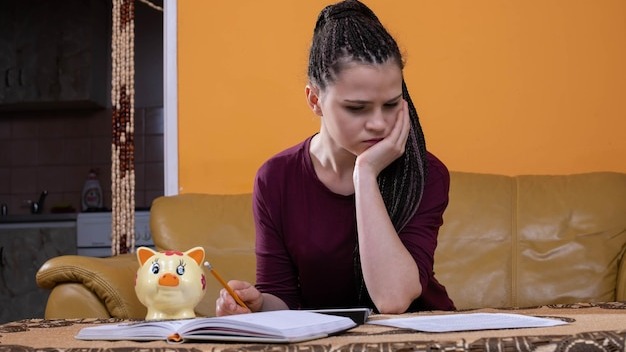 After adding up the money it turns out that there is a huge loss and the young adult is in danger of going bankrupt and starving for weeks