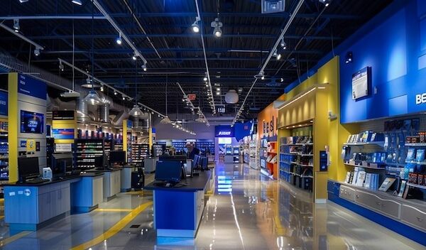 Inside of a large Walmart Supercenter grocery store department isles with fully stocked shelves and no people in view
