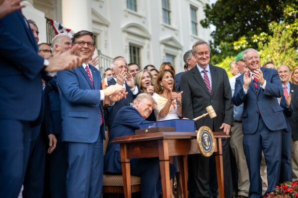 President Donald Trump hammers a gavel after signing the One Big Beautiful Bill Act on the South Lawn of the White House (54635043475)