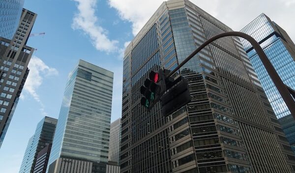 Low angle view of modern buildings against sky in city
