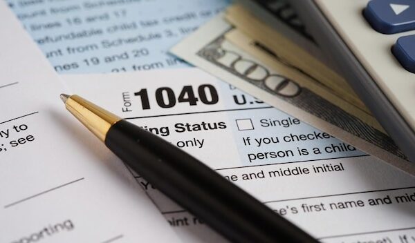 Tax form 1040 US Individual Income Tax Return business finance concept