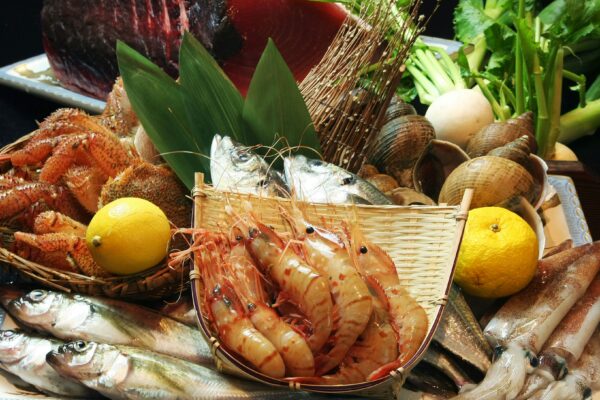 A plate of seafood and vegetables on a table