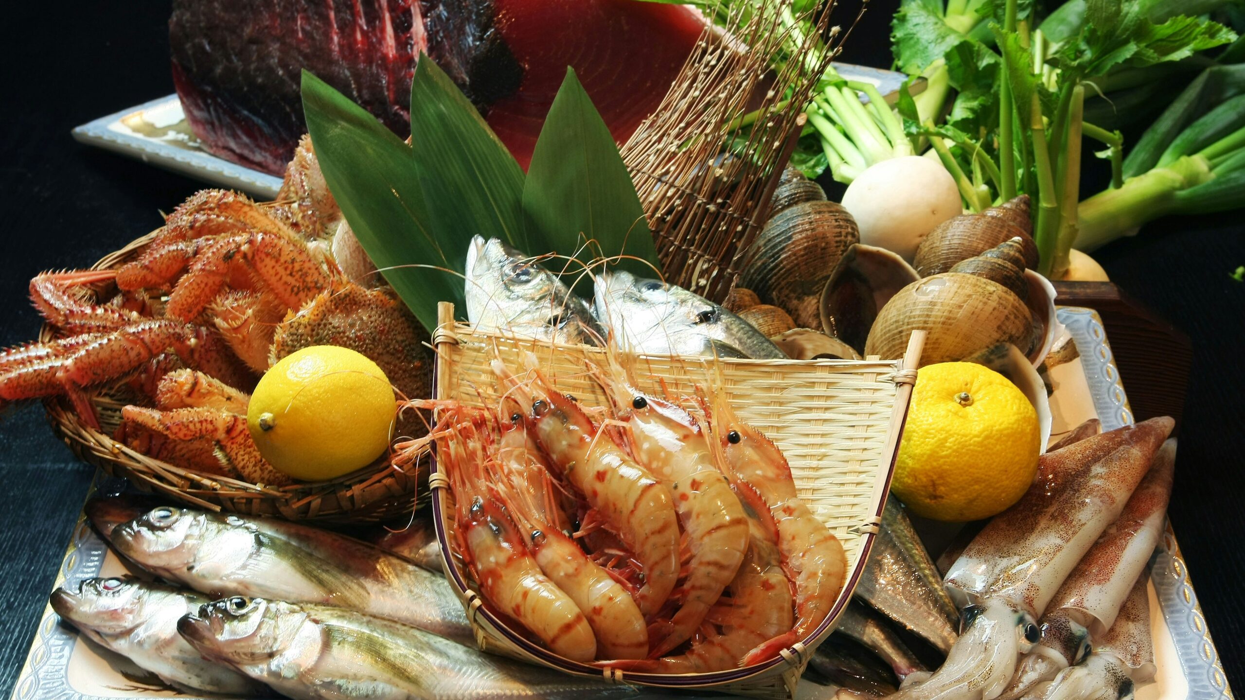 A plate of seafood and vegetables on a table