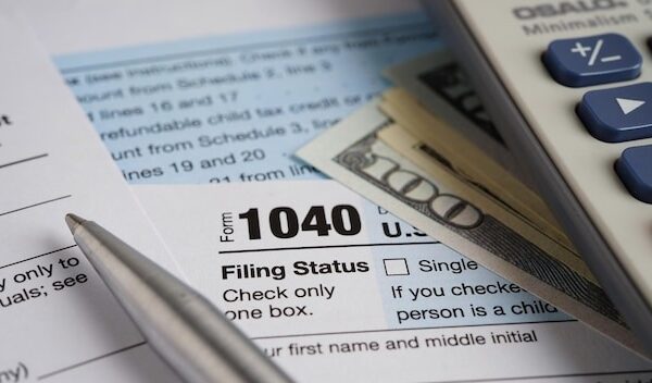 Tax form 1040 US Individual Income Tax Return business finance concept