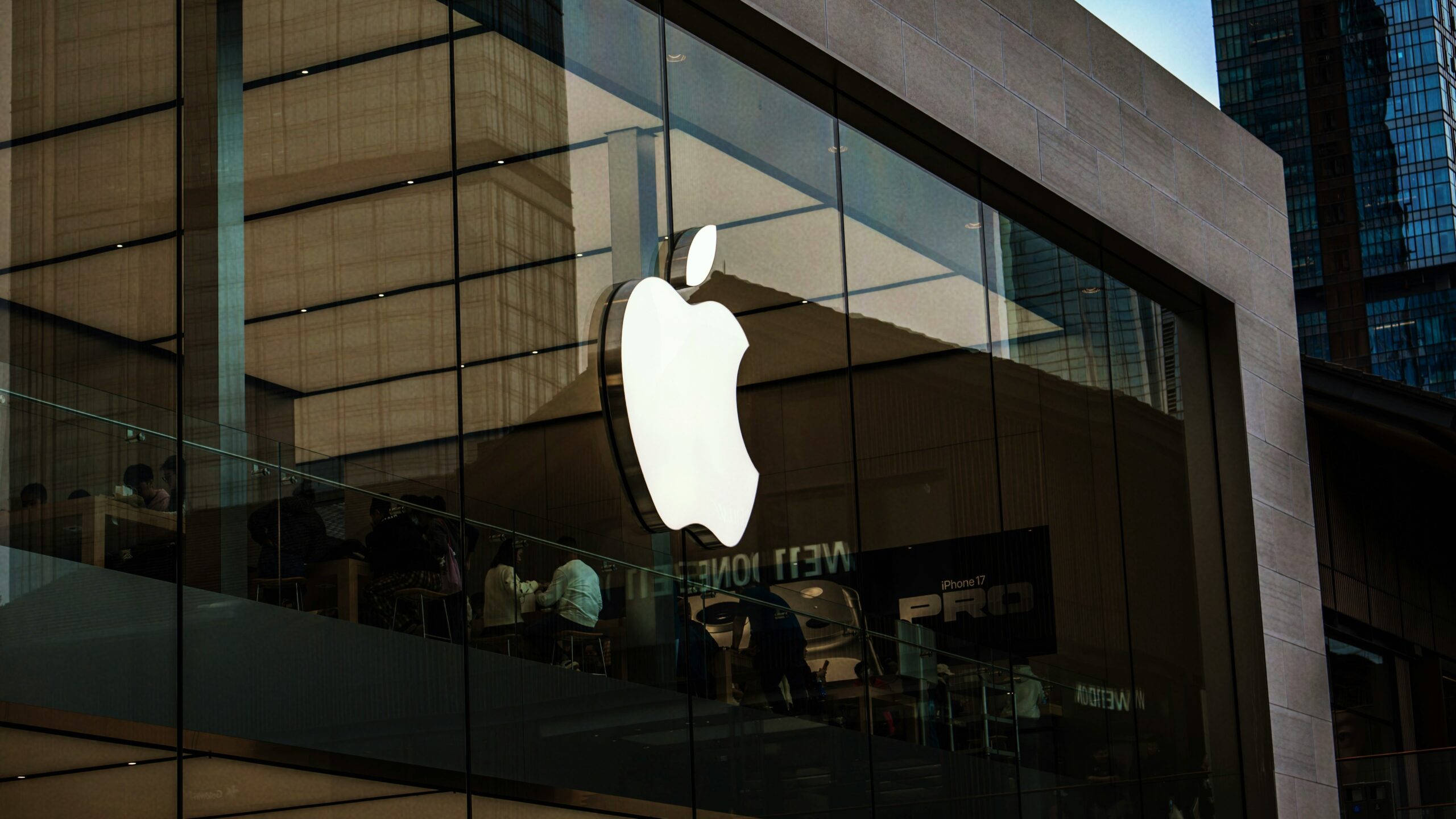 Apple store exterior with large illuminated logo